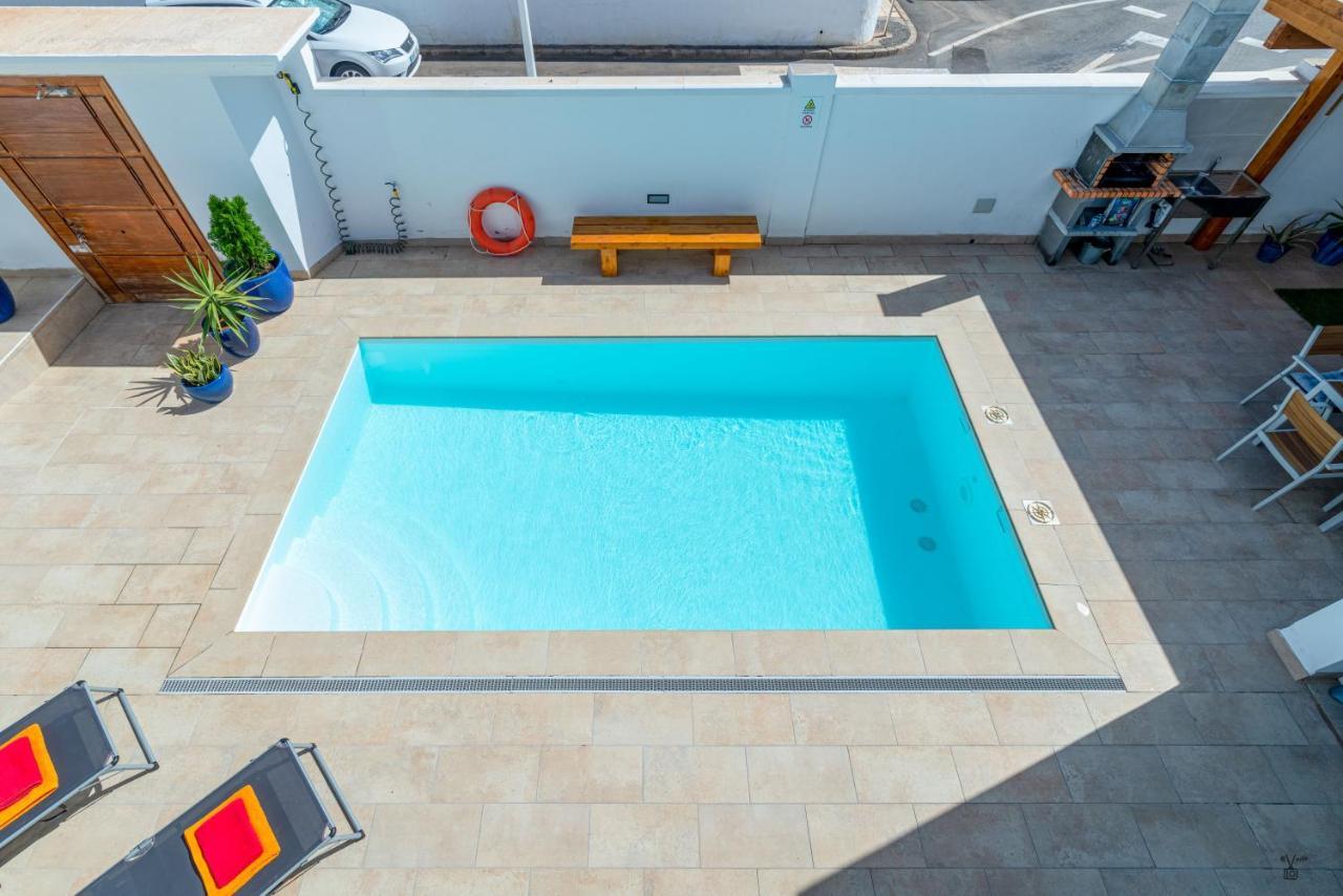 Amaru Villa ปูแอร์โตเดลคาร์เมน ภายนอก รูปภาพ