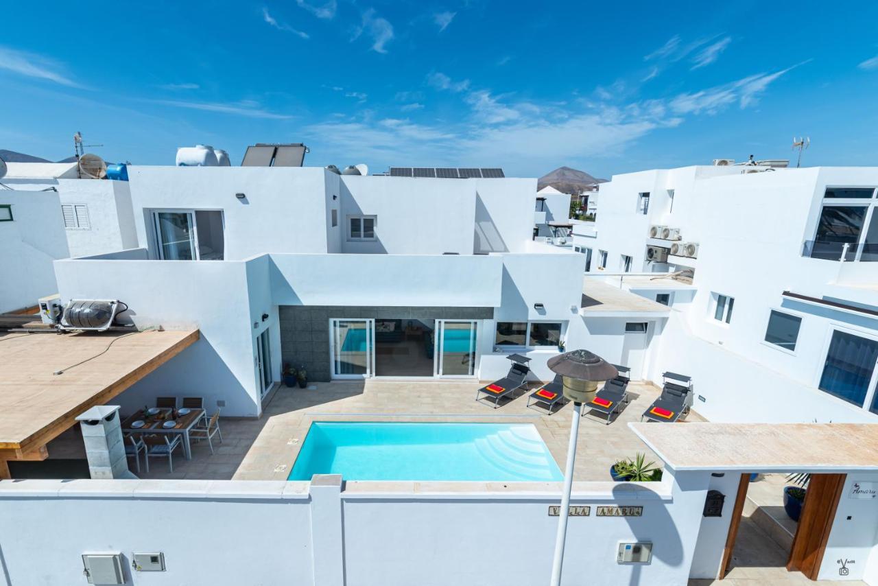 Amaru Villa ปูแอร์โตเดลคาร์เมน ภายนอก รูปภาพ